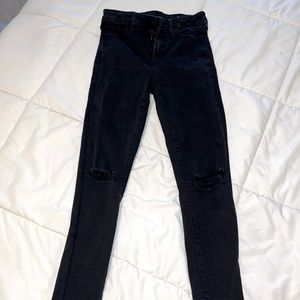 Next level high rise black American eagle jeans holes in knees